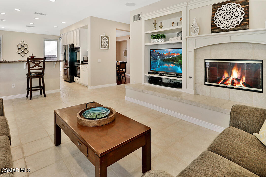 151 Brooks Road Simi Valley, CA 93065 - Photo 21 of 56 a living room with furniture and a fireplace