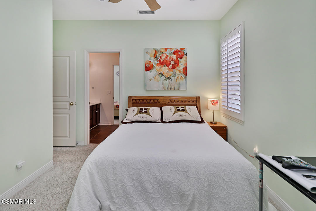151 Brooks Road Simi Valley, CA 93065 - Photo 35 of 56 a bedroom with a bed and a painting on the wall