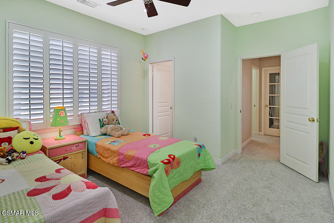 151 Brooks Road Simi Valley, CA 93065 - Photo 37 of 56 a bedroom with a bed and a window