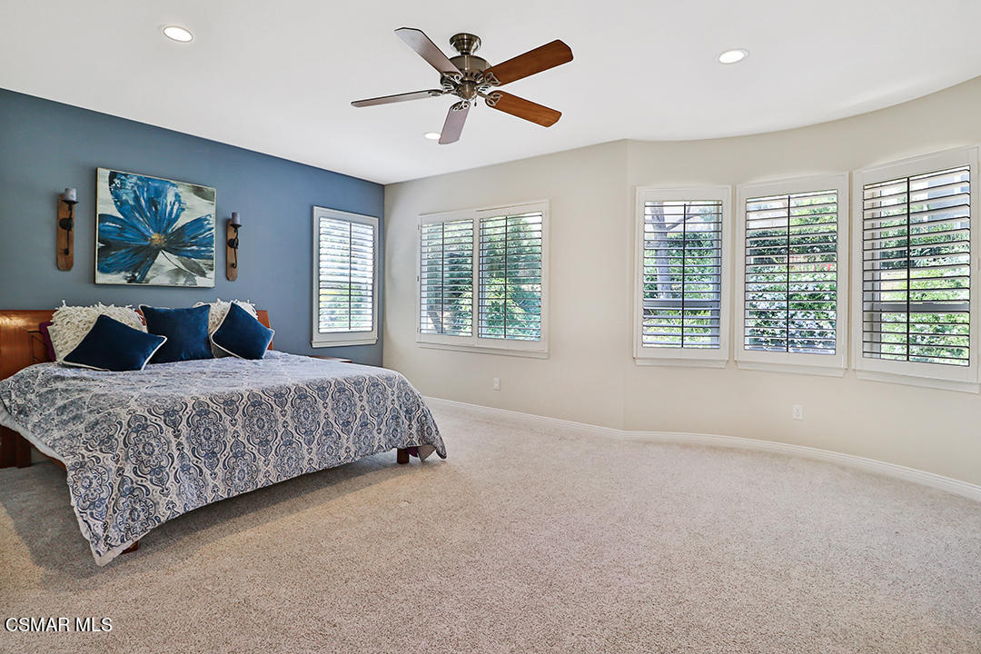 151 Brooks Road Simi Valley, CA 93065 - Photo 43 of 56 a bedroom with a large bed and a large window