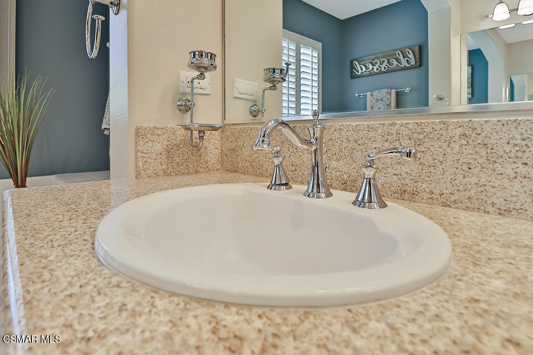 151 Brooks Road Simi Valley, CA 93065 - Photo 49 of 56 a bathroom with a sink and a mirror