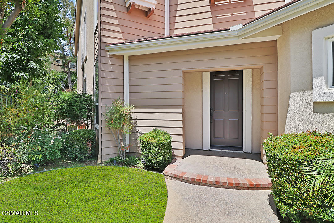 151 Brooks Road Simi Valley, CA 93065 - Photo 6 of 56 a front view of a house with garden
