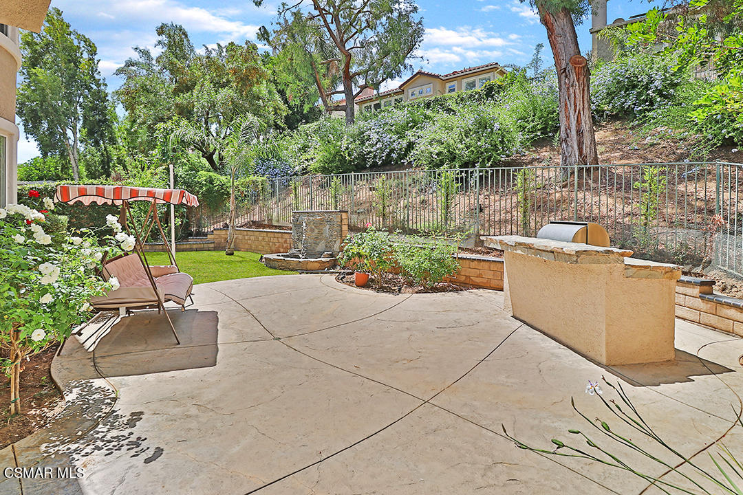 151 Brooks Road Simi Valley, CA 93065 - Photo 52 of 56 a view of a backyard with sitting area and tree s