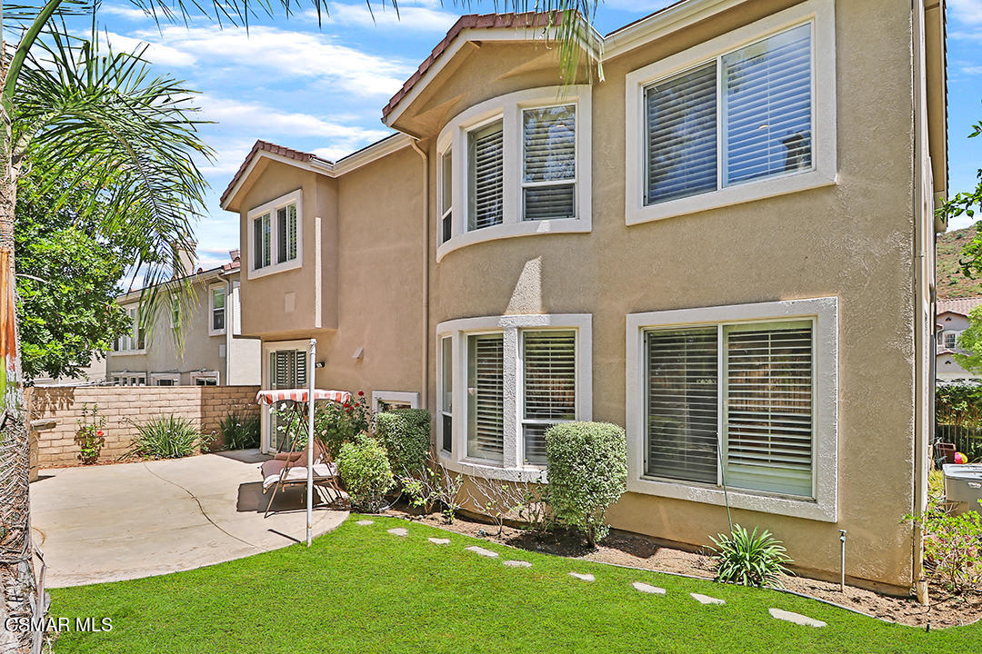 151 Brooks Road Simi Valley, CA 93065 - Photo 55 of 56 a front view of a house with a yard
