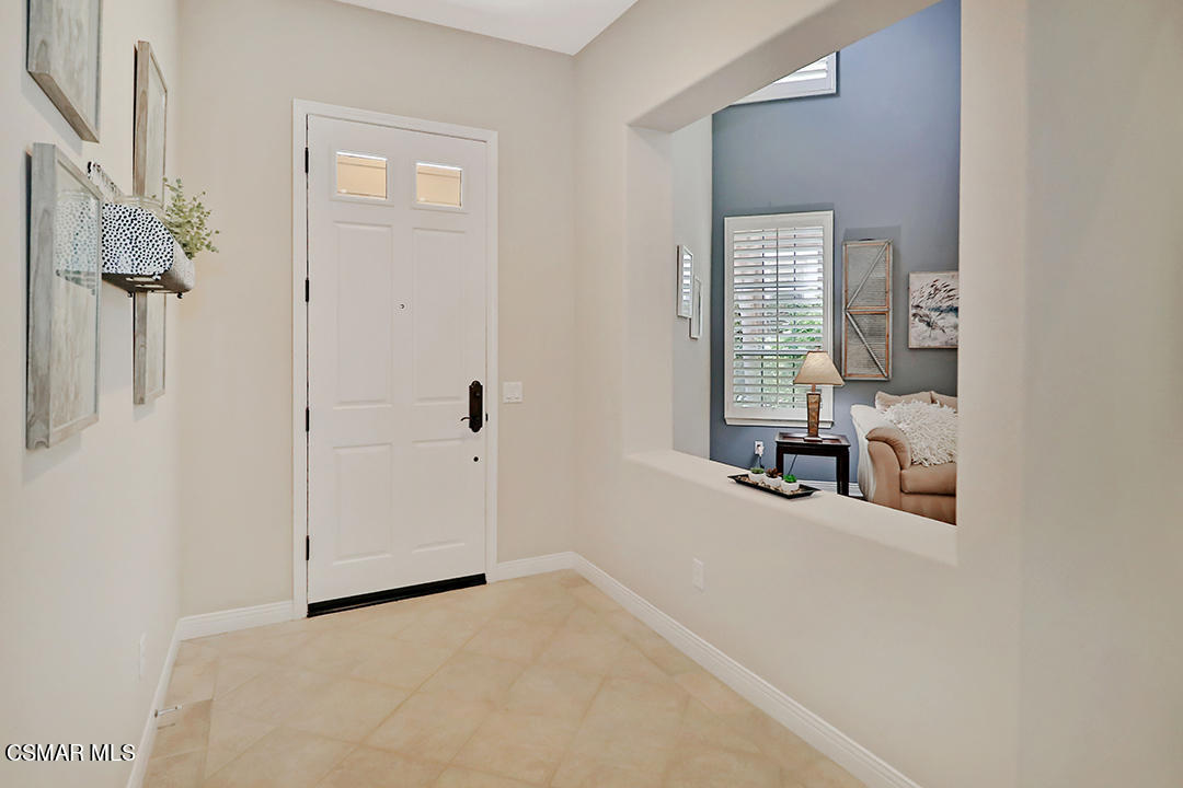 151 Brooks Road Simi Valley, CA 93065 - Photo 8 of 56 a view of a livingroom with a hardwood floor and a ceiling fan