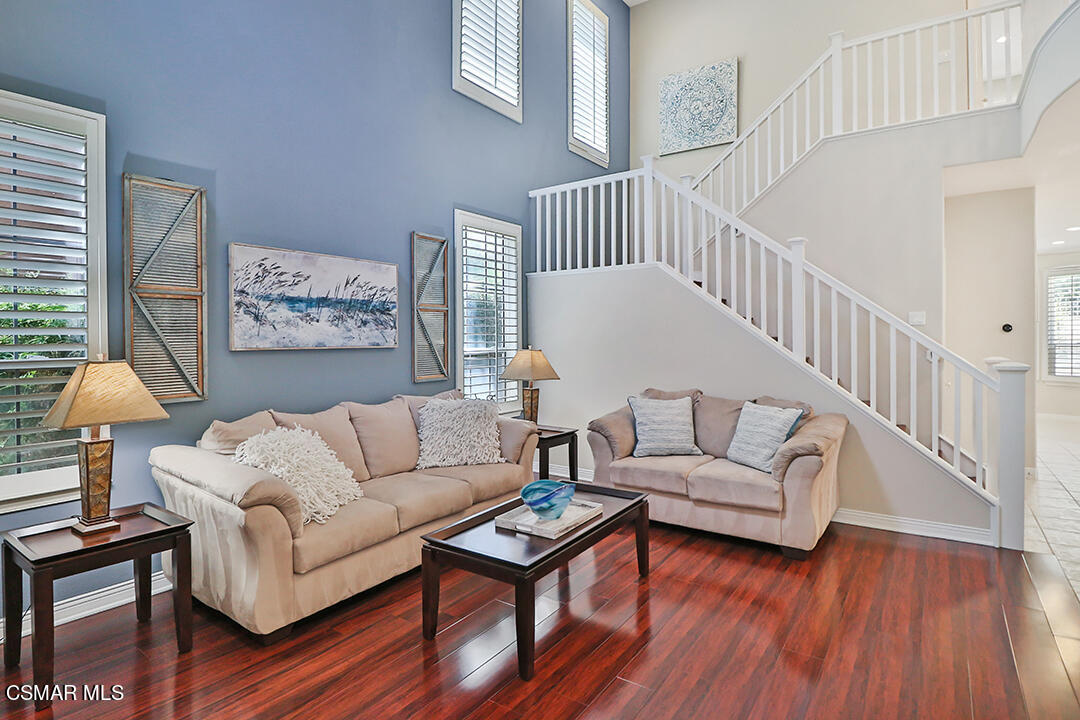 151 Brooks Road Simi Valley, CA 93065 - Photo 9 of 56 a living room with furniture and a table with wooden floor
