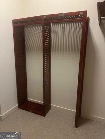 a bathroom with a glass shower door