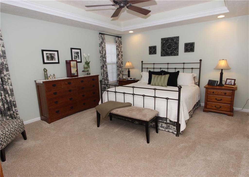 207 Maple Ridge Drive Canonsburg, PA 15317 - Photo 11 of 24 Large master bedroom with neutral paint, newer carpet & tray ceiling with accent lighting