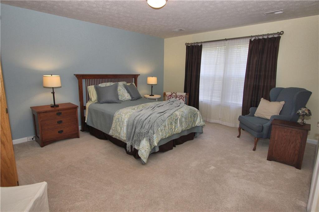 207 Maple Ridge Drive Canonsburg, PA 15317 - Photo 19 of 24 Large upstairs bedroom with neutral carpet and walk-in closet