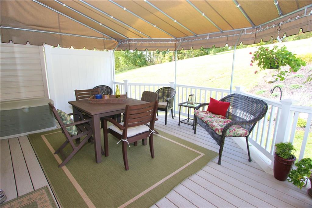 207 Maple Ridge Drive Canonsburg, PA 15317 - Photo 22 of 24 Ground level deck, private & covered by an awning, perfect for hot summer days