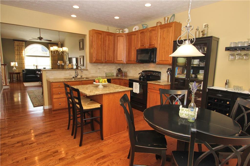 207 Maple Ridge Drive Canonsburg, PA 15317 - Photo 8 of 24 Lovely, eat in kitchen with quartz countertops and island. Island great for additional work space or a quick meal!