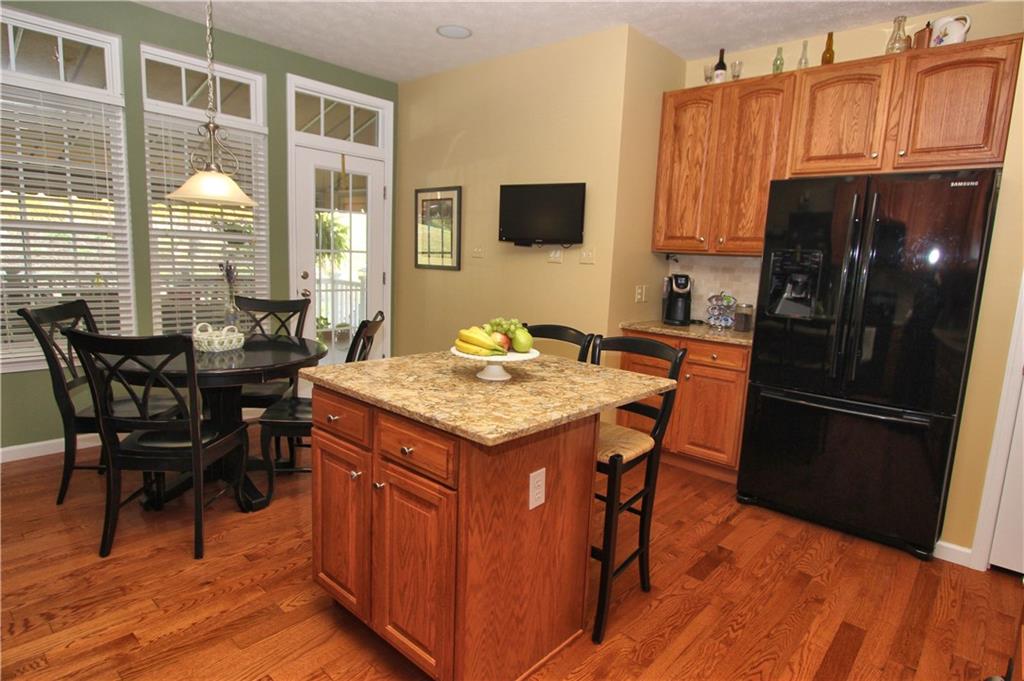207 Maple Ridge Drive Canonsburg, PA 15317 - Photo 9 of 24 Hardwood floors, extra tall cabinets and pantry as well as additional storage in island!