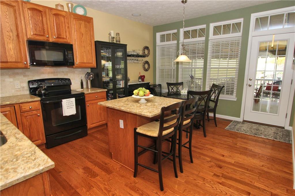 207 Maple Ridge Drive Canonsburg, PA 15317 - Photo 10 of 24 Another view of the kitchen with lots of natural light, access to deck and plenty of space to add your own touches!