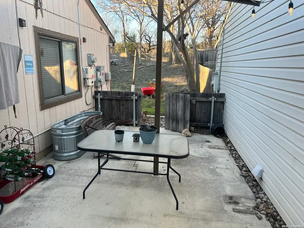 a view of a porch with furniture