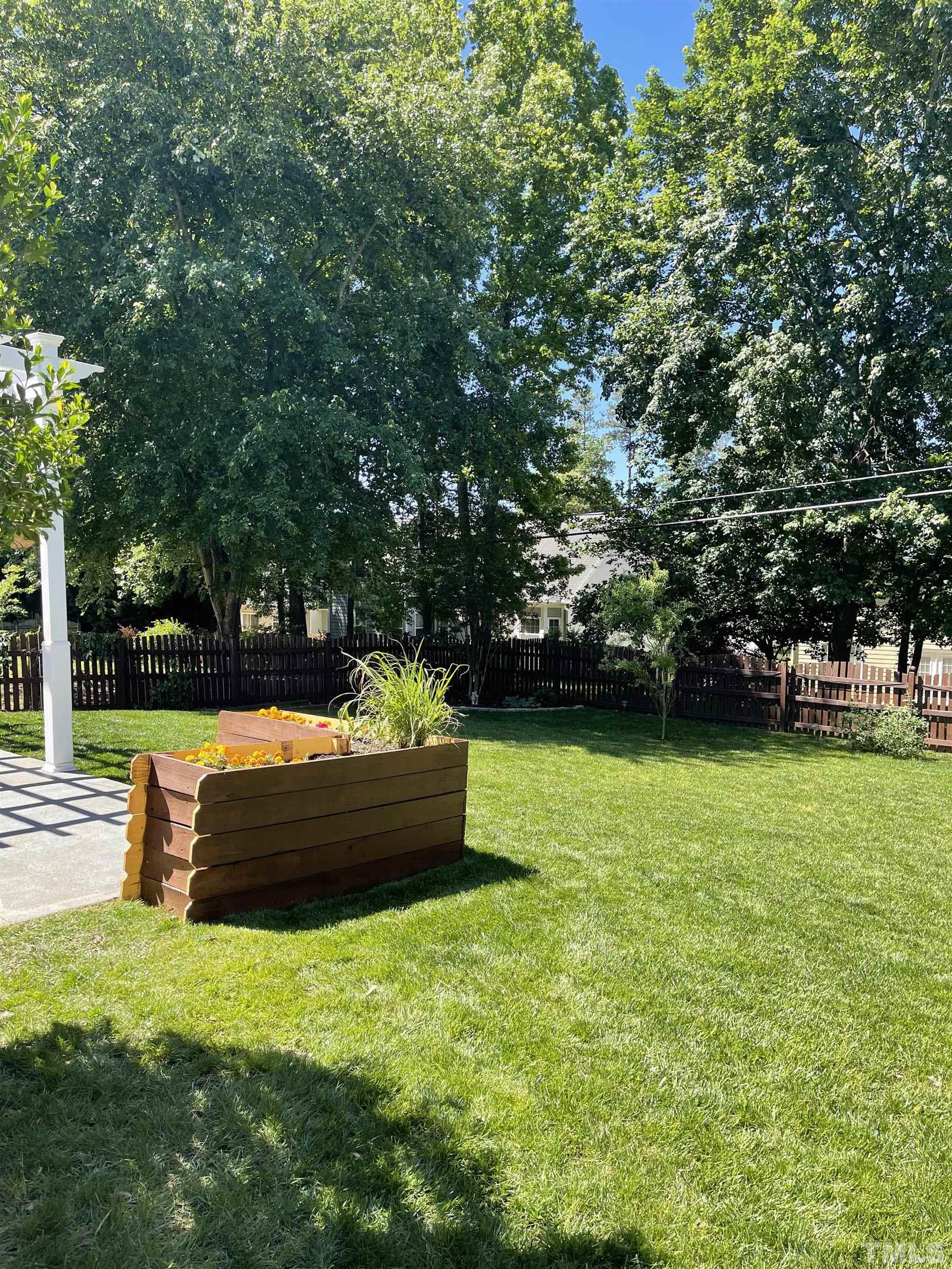 5333 Bartram Place Raleigh, NC 27617 - Photo 6 of 24 a view of outdoor space and yard