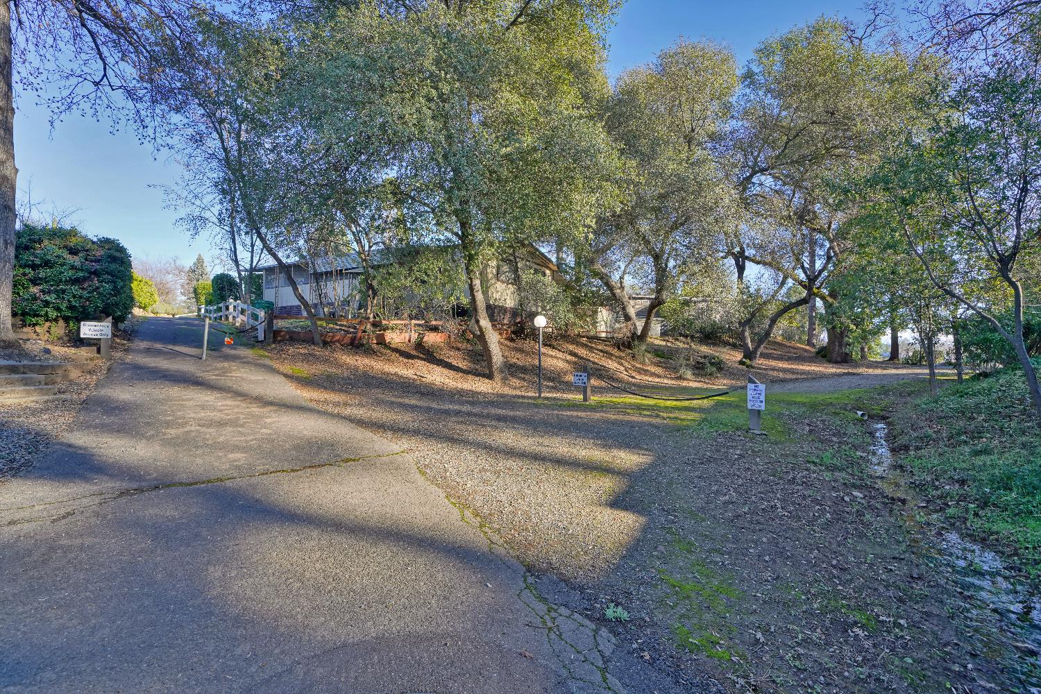 4420 Pleasant Valley Road, Unit 155 Diamond Springs, CA 95619 - Photo 42 of 42 a view of a park with large trees