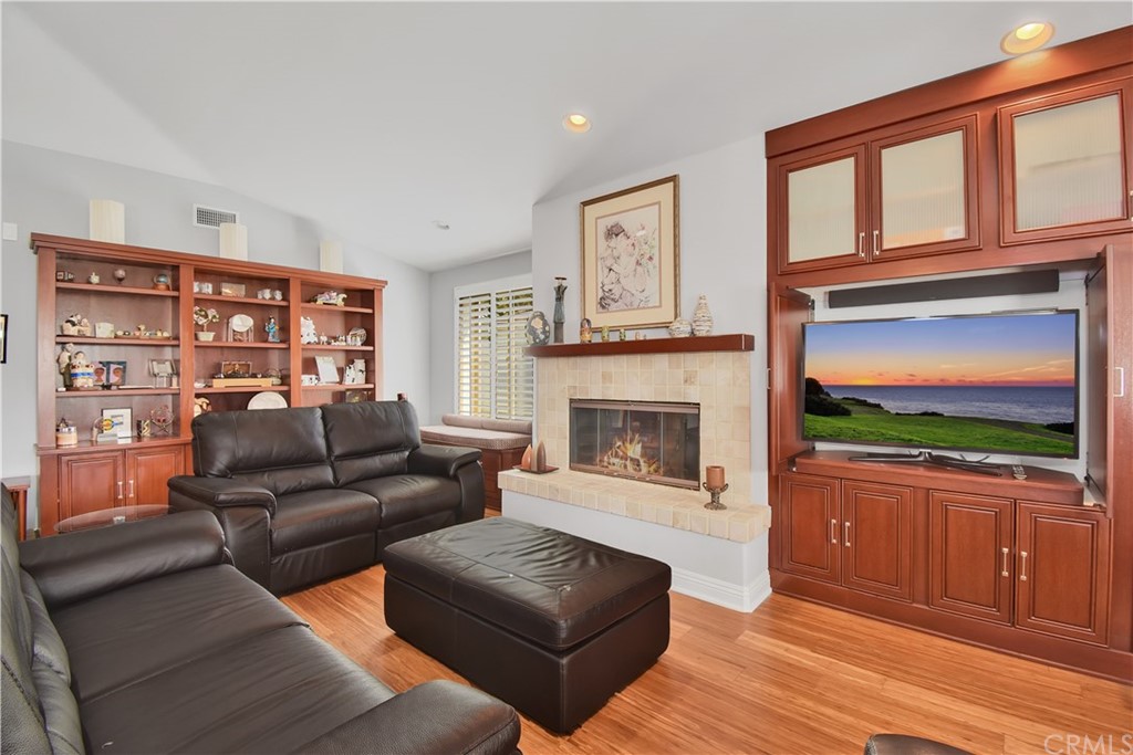 22 Hillcrest Manor Rolling Hills Estates, CA 90274 - Photo 12 of 54 a living room with furniture and a flat screen tv