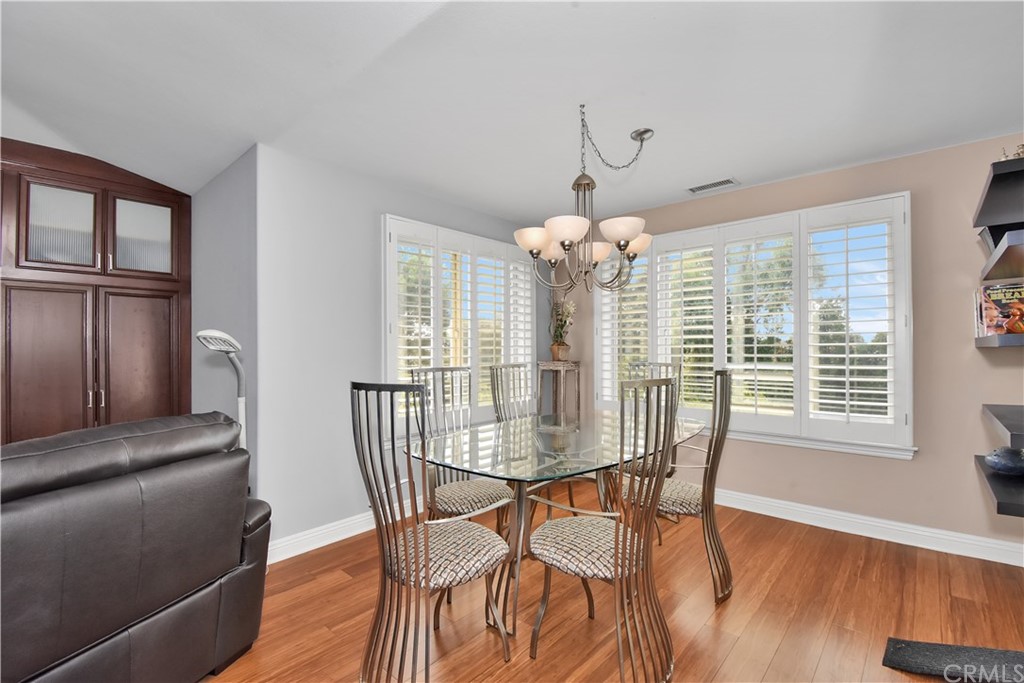 22 Hillcrest Manor Rolling Hills Estates, CA 90274 - Photo 13 of 54 a view of a dining room with furniture window and wooden floor