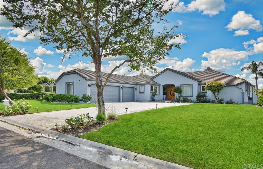 22 Hillcrest Manor Rolling Hills Estates, CA 90274 - Photo 2 of 54 a front view of a house with garden
