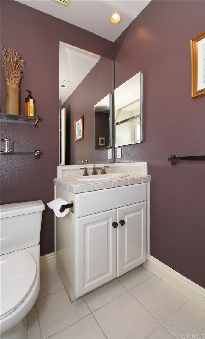 22 Hillcrest Manor Rolling Hills Estates, CA 90274 - Photo 21 of 54 a bathroom with a sink toilet and mirror
