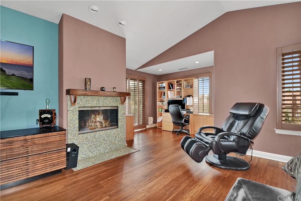 22 Hillcrest Manor Rolling Hills Estates, CA 90274 - Photo 24 of 54 a living room with furniture and a fireplace