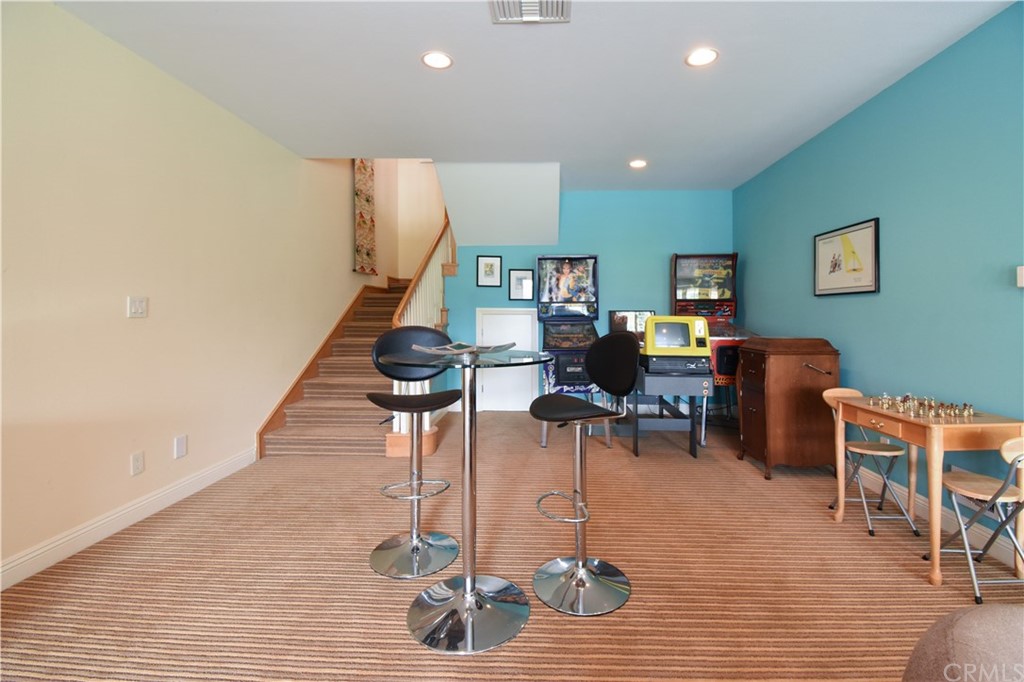22 Hillcrest Manor Rolling Hills Estates, CA 90274 - Photo 32 of 54 a work room with furniture and wooden floor