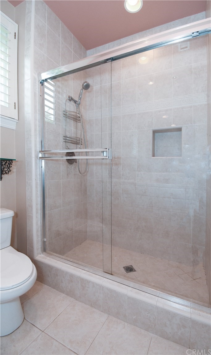 22 Hillcrest Manor Rolling Hills Estates, CA 90274 - Photo 39 of 54 a bathroom with a shower and a toilet
