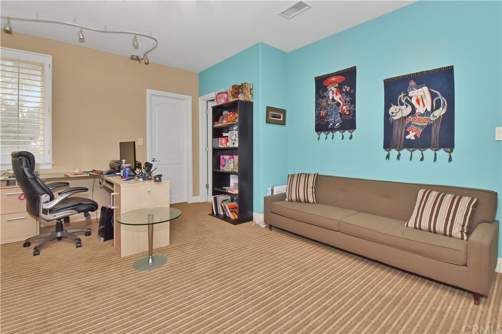 22 Hillcrest Manor Rolling Hills Estates, CA 90274 - Photo 41 of 54 a living room with furniture and a couch