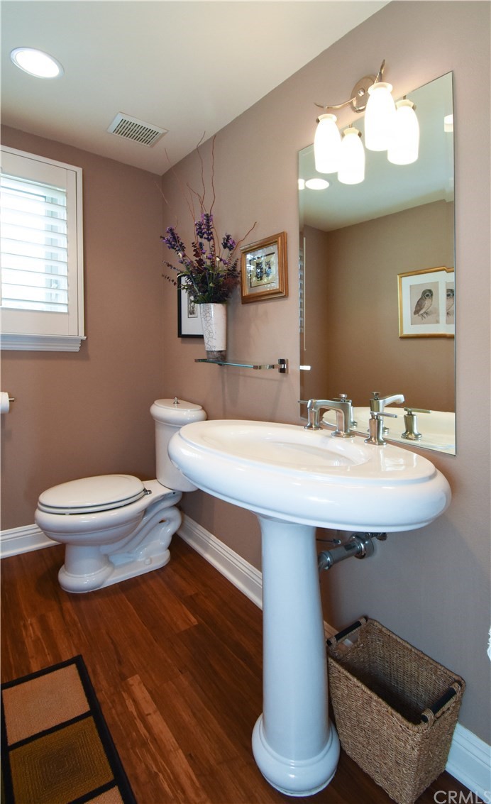 22 Hillcrest Manor Rolling Hills Estates, CA 90274 - Photo 45 of 54 a bathroom with a sink and a mirror