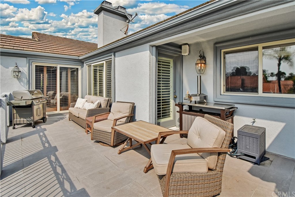 22 Hillcrest Manor Rolling Hills Estates, CA 90274 - Photo 48 of 54 a view of a patio with a table and chairs
