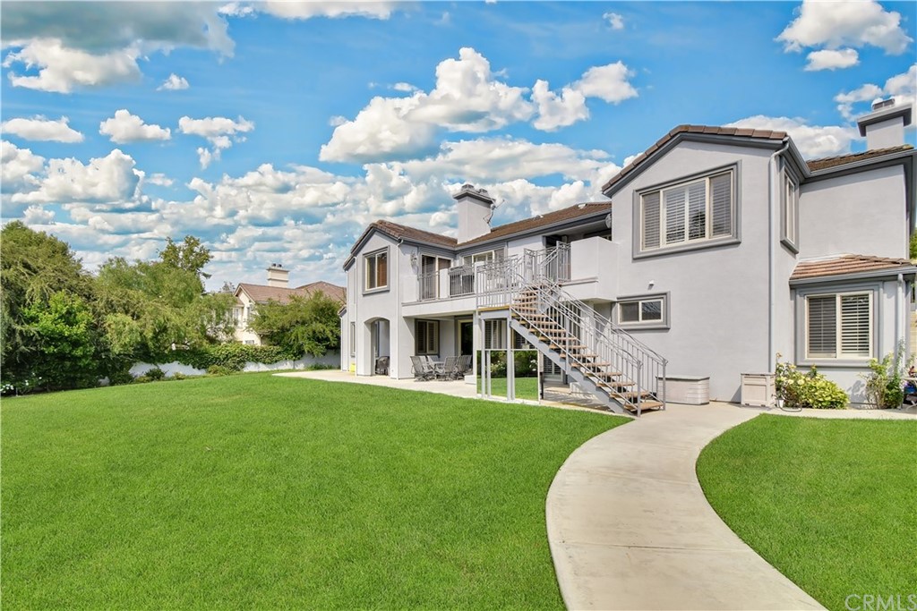 22 Hillcrest Manor Rolling Hills Estates, CA 90274 - Photo 49 of 54 a front view of a house with garden