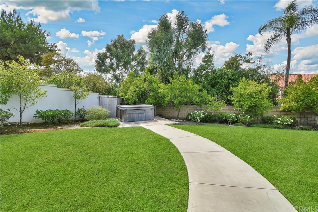22 Hillcrest Manor Rolling Hills Estates, CA 90274 - Photo 52 of 54 a view of a garden with a building in the background