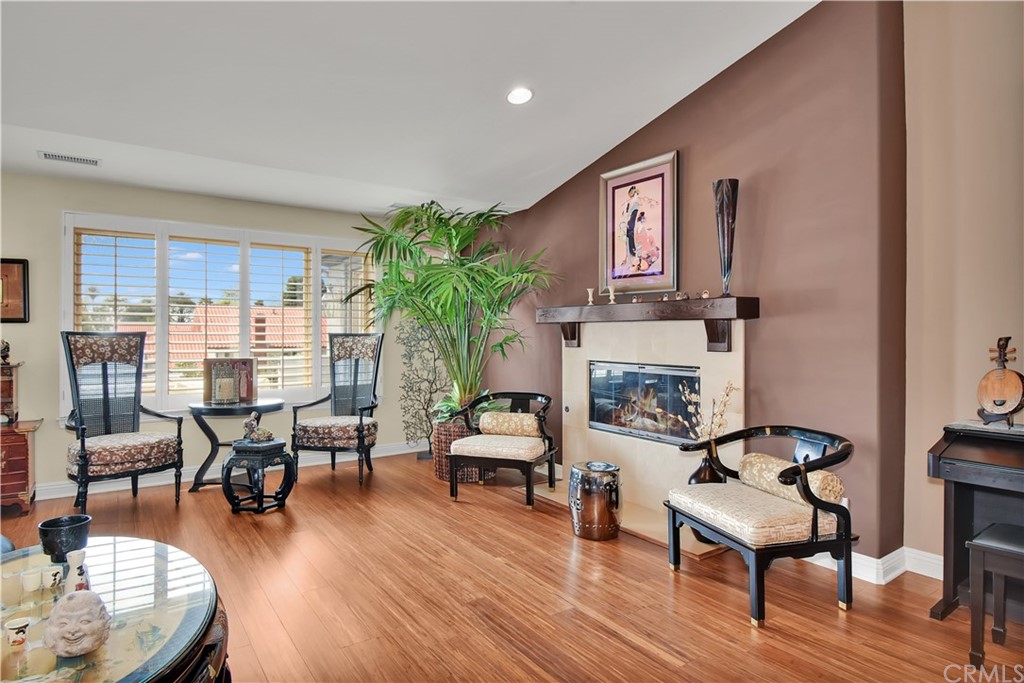 22 Hillcrest Manor Rolling Hills Estates, CA 90274 - Photo 6 of 54 a living room with furniture or fireplace and wooden floor
