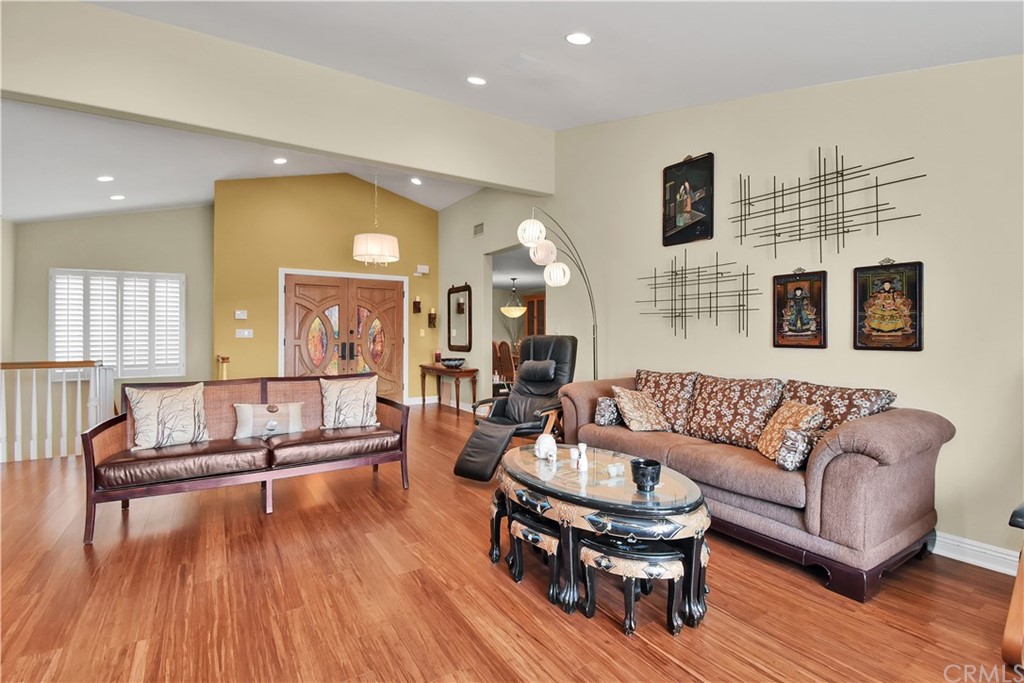 22 Hillcrest Manor Rolling Hills Estates, CA 90274 - Photo 8 of 54 a living room with furniture and a wooden floor