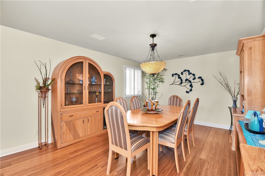 22 Hillcrest Manor Rolling Hills Estates, CA 90274 - Photo 10 of 54 a view of a dining room with furniture window and wooden floor