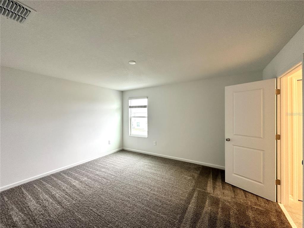 1784 Foreman Road Eagle Lake, FL 33839 - Photo 13 of 24 an empty room with windows