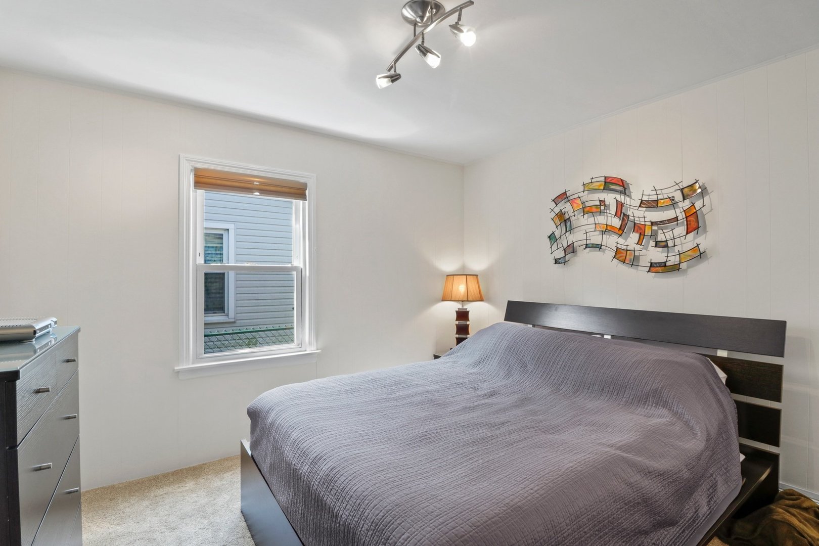 10930 Oak Avenue Chicago Ridge, IL 60415 - Photo 12 of 20 a bedroom with a bed and a window