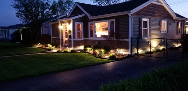 10930 Oak Avenue Chicago Ridge, IL 60415 - Photo 18 of 20 a front view of a house with a garden