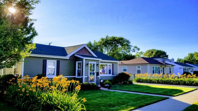 10930 Oak Avenue Chicago Ridge, IL 60415 - Photo 20 of 20 a front view of a house with a yard