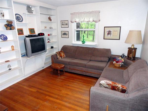 62 Old County Road Lancaster, MA 01523 - Photo 3 of 16 a living room with furniture and a window