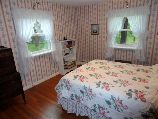 62 Old County Road Lancaster, MA 01523 - Photo 9 of 16 a bedroom with a bed and a window