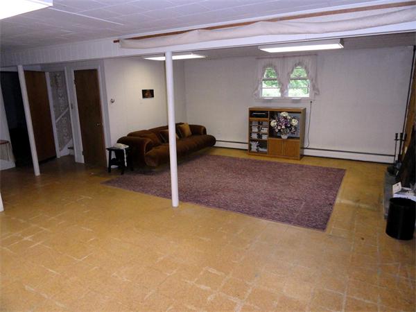 62 Old County Road Lancaster, MA 01523 - Photo 10 of 16 a view of livingroom with furniture and a window