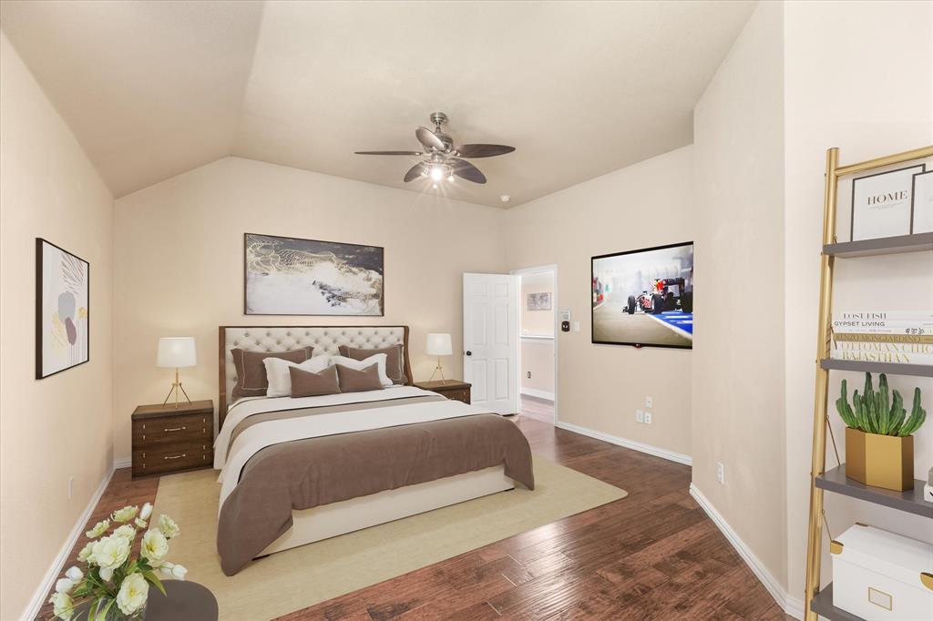 8013 Springmoss Drive Plano, TX 75025 - Photo 13 of 23 a bedroom with a large bed and a chandelier