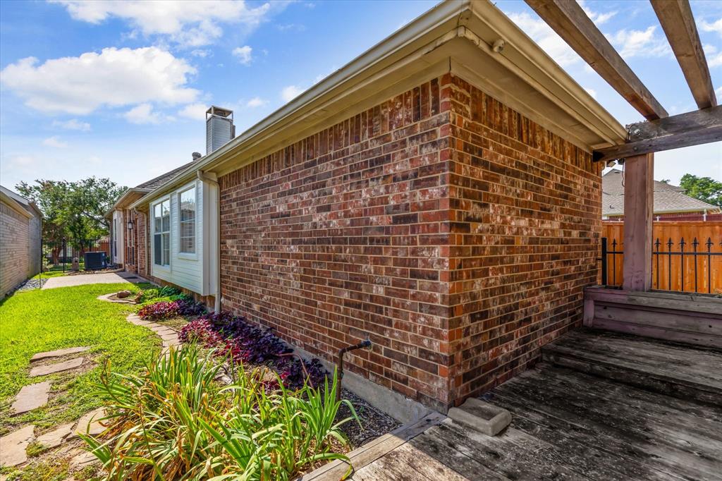 8013 Springmoss Drive Plano, TX 75025 - Photo 23 of 23 a view of a backyard