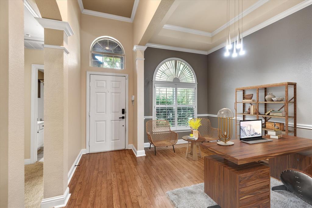 8013 Springmoss Drive Plano, TX 75025 - Photo 3 of 23 a living room with furniture and wooden floor