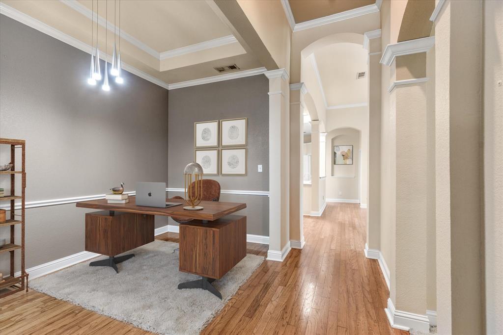 8013 Springmoss Drive Plano, TX 75025 - Photo 5 of 23 a workspace with wooden floor and furniture