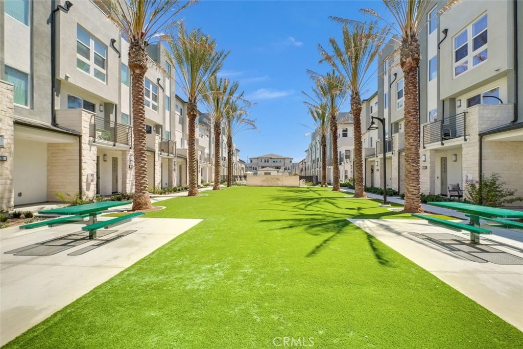 a house with swimming pool in front of it