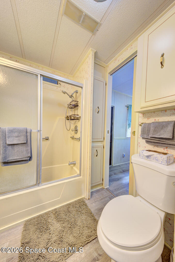 283 Buffalo Place Rockledge, FL 32955 - Photo 20 of 23 a bathroom with a toilet and a shower