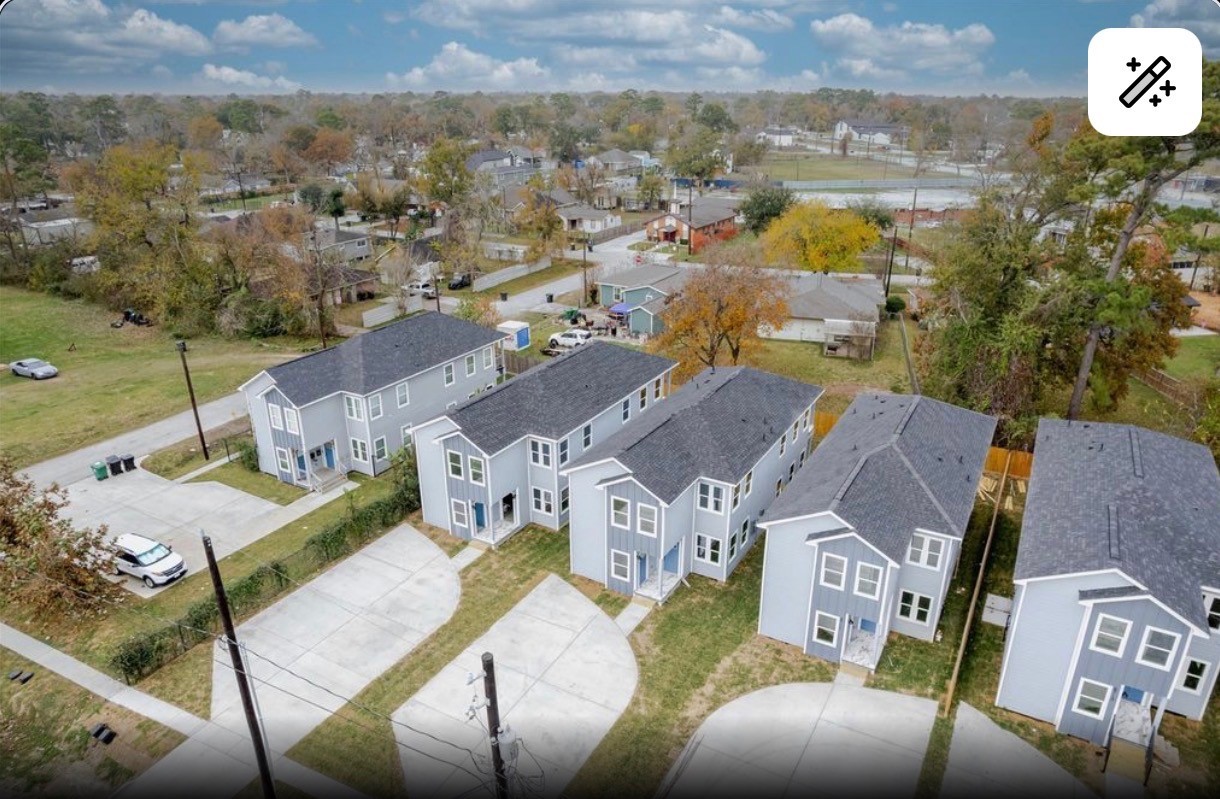 8713 Westcott Road, Unit B Houston, TX 77016 - Photo 2 of 14 an aerial view of a house with a swimming pool