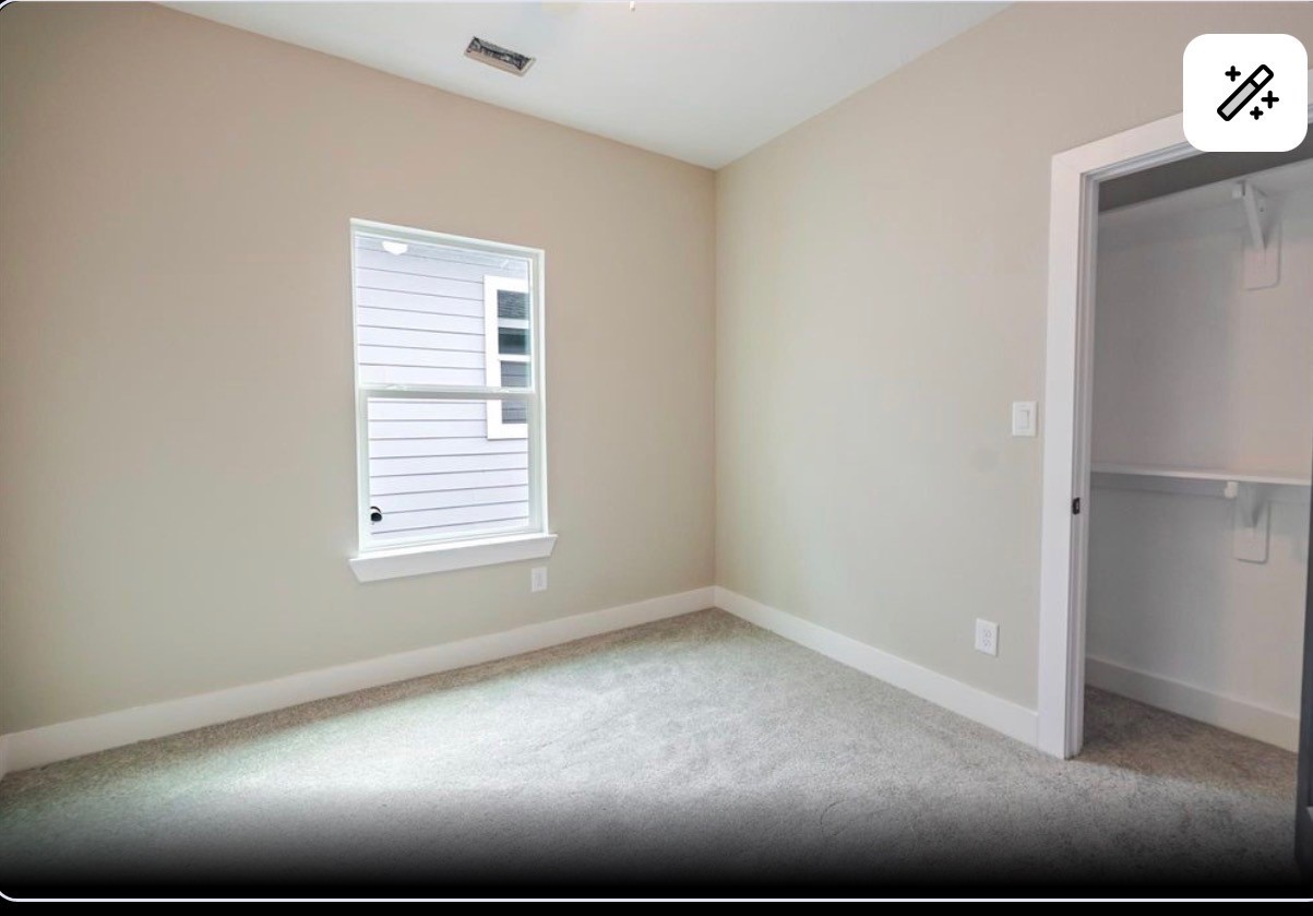 8713 Westcott Road, Unit B Houston, TX 77016 - Photo 10 of 14 an empty room with a window